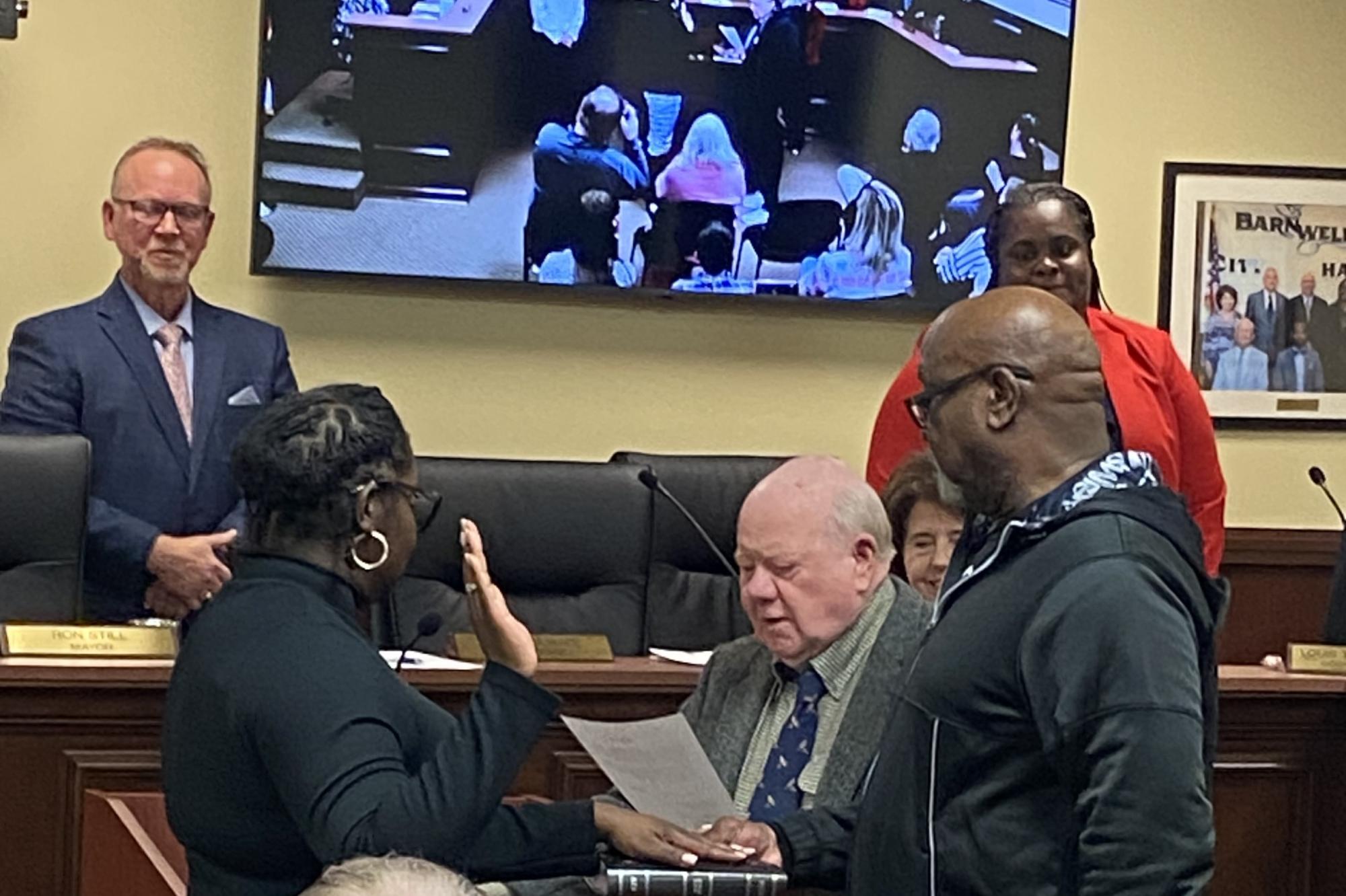 Council Member Wanda Highsmith being sworn in